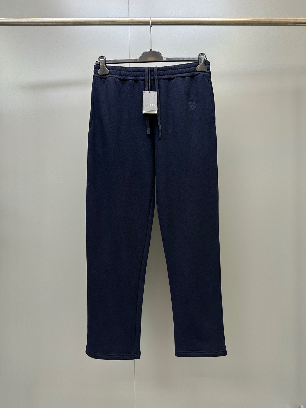 Falection FW26 Embroidered Sweatpants in Navy