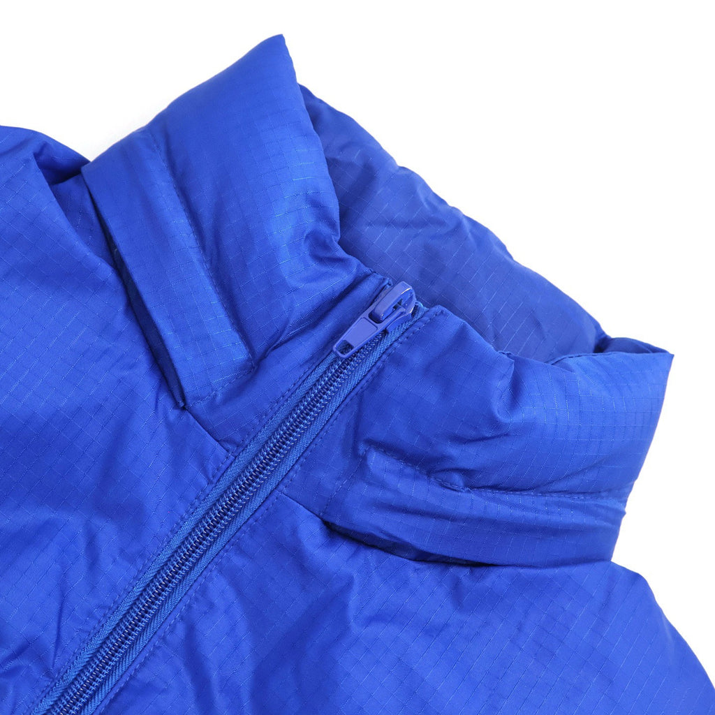 Falection FW26 Quilted Logo Puffer Jacket in Blue