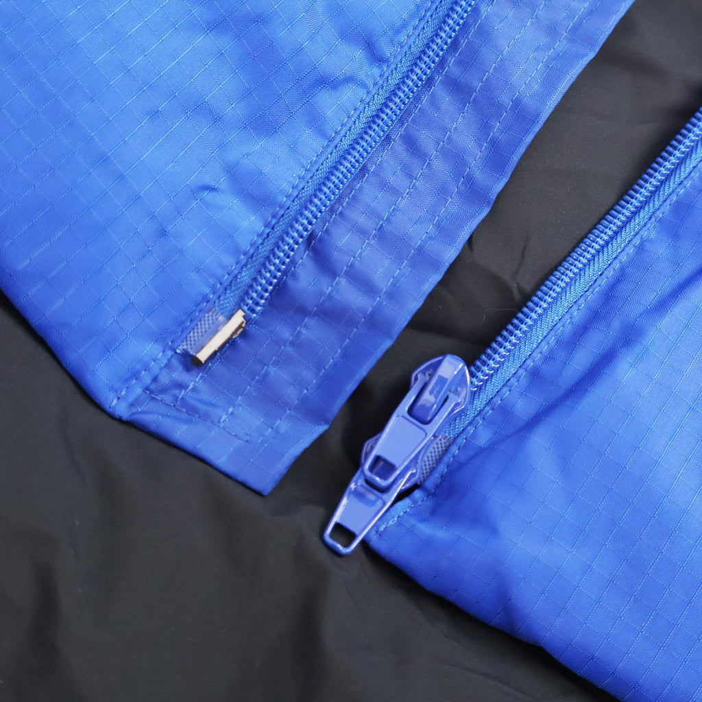 Falection FW26 Quilted Logo Puffer Jacket in Blue