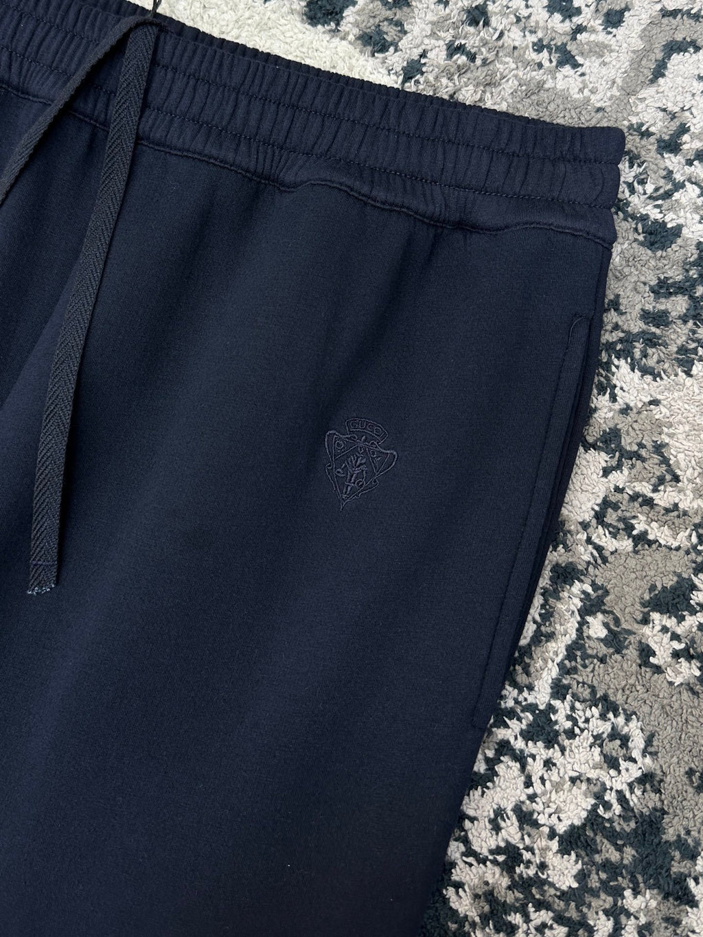 Falection FW26 Embroidered Sweatpants in Navy